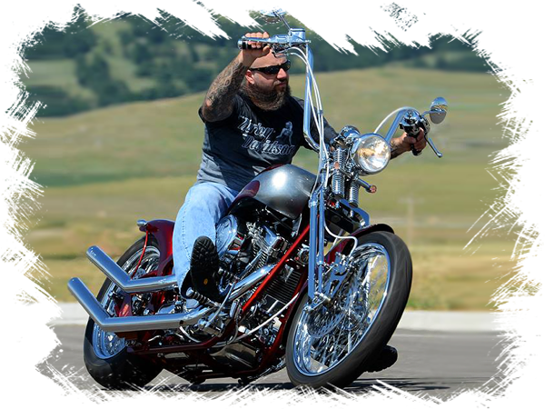 Hellion Custon Cycles ower, Bill Raber, riding one of his custom motorcycles.